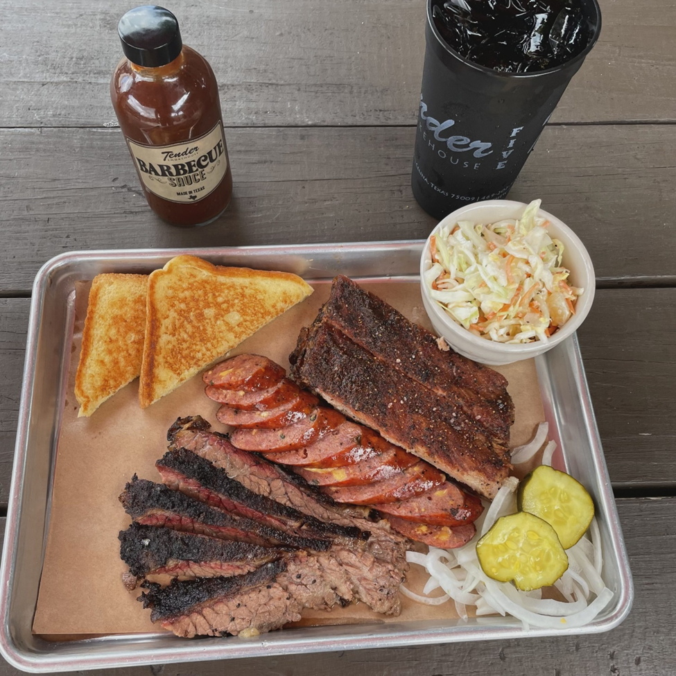 Tender's variety of tasty meats, Texas toast, coleslaw, pickles, onions, BBQ sauce, and drink.
